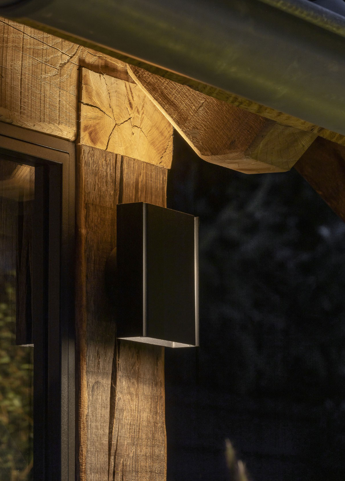 Luxury outdoor space with integrated garden and architectural lighting