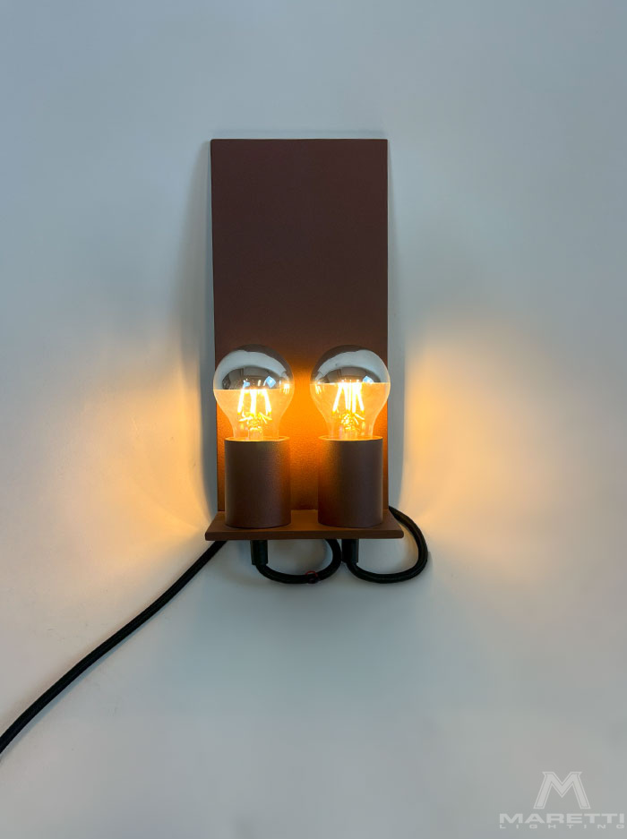 Trijnie bronze wall lamp designed by Piet Boon
