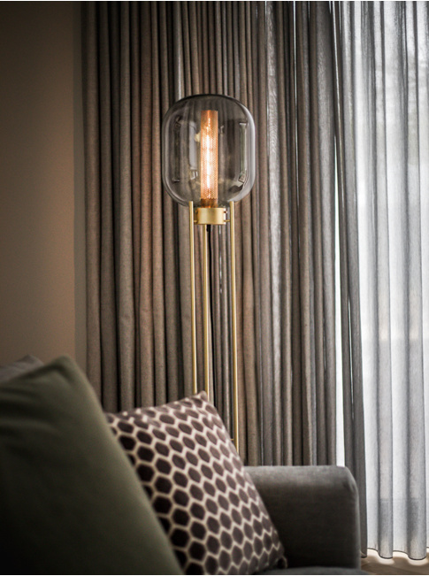 Rivington glass brass floor lamp designed by Brands-Concept