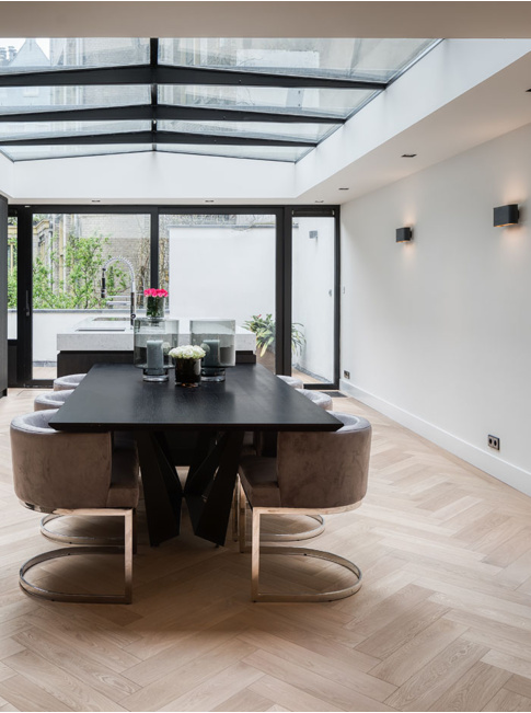 Hicks wide black wall lamp designed by Hip Studio